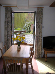 The Dining/Living Room with French Windows to Terrace